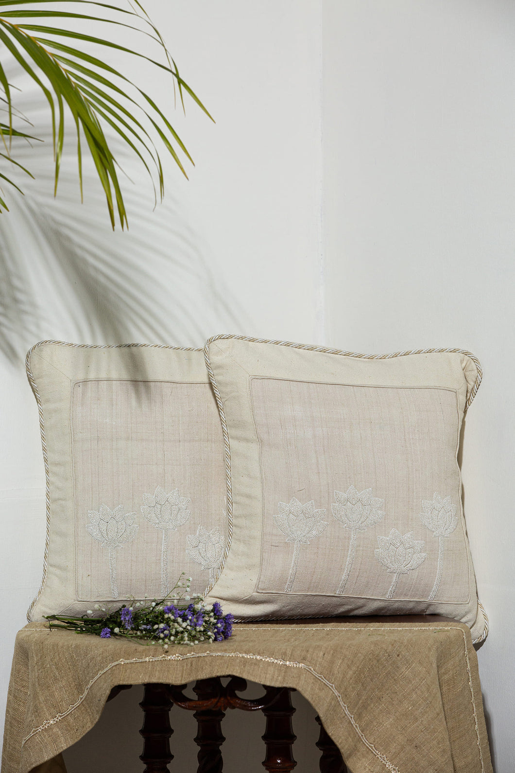 White Eri Cushion With Basket Weave Border And Konted Design